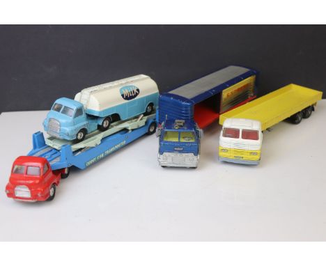 Four Corgi diecast models to include Big Bedford Tractor Unit, Carrimore Car Transporter, Articulated Trailer x 2 (both varia