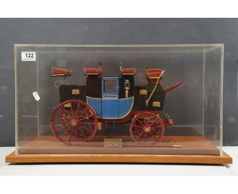 A cased kit built highly detailed model of an English stage coach. Case measures approx 60 x 32 x 30cm 