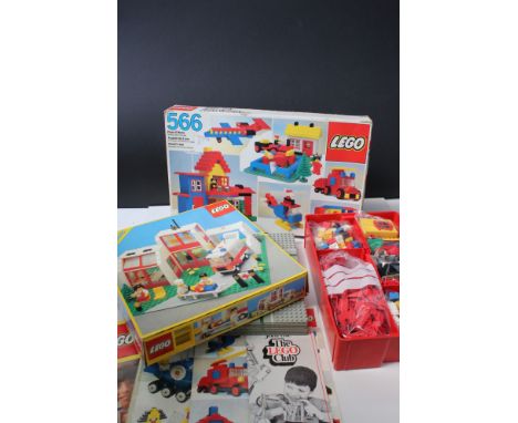 A large collection of Lego to include set 6380 Ambulance Station, 6372 Cottage, 6501 Black Car, 6522 Motorcycle Policeman wit