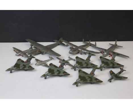 11 Mid 20th C play worn Dinky diecast model planes to include 5 x Gloster Javelin, Viking, Meteor etc 