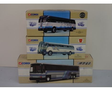 Three boxed Corgi Classics Vintage Buses USA diecast models to include 98461 Battle of Britain Yellow Coach 743, 98473 Yellow