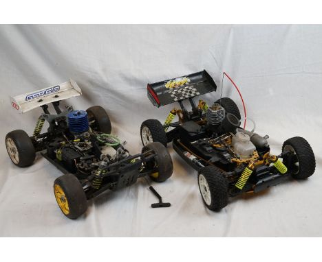 A RC car buggy 1/8 scale Protech Ultrex Evo Nitro 0.21 4WD engine together with a CEN GSR 5.0 Nitro Monster truck (2008) 4WD 