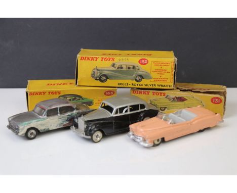 Three boxed Dinky diecast models to include 131 Cadillac Tourer in pink with driver, 165 Humber Hawk (repainted) and 150 Roll