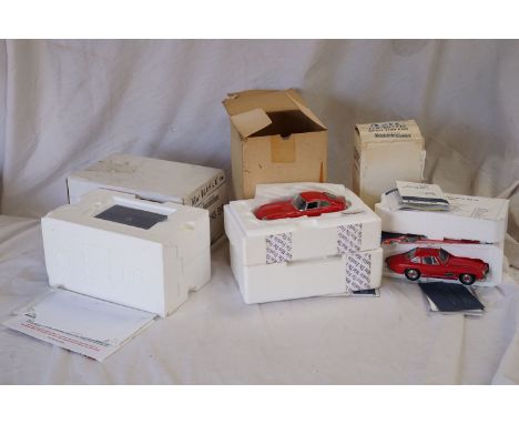 Three boxed Franklin Mint 1:24 model to include Mercedes-Benz 300 SL, 1901 Jaguar E-Type Coupe and Volkswagen New Beetle, wit