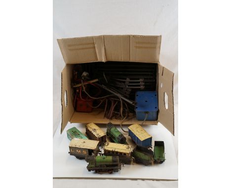Quantity of early - mid 20th C Hornby O gauge model railway to include 2 x 0-4-0 locomotives, 5 x items of rolling stock, tra