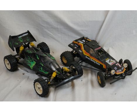 A Tamiya Hornet 1/10 scale electric buggy 1984-92 grasshopper chassis together with a Tamiya 4WD buggy with electric chassis 