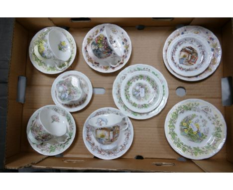 A collection of Royal Doulton Brambly Hedge patterned Cups &amp; Saucers, plates dishes &amp; side plates 