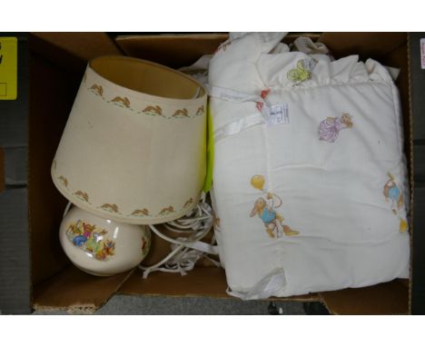 Collection of Royal Doulton Bunnykins to include table lamp with shade, cot pillow and royal doulton band march of the bunnyk