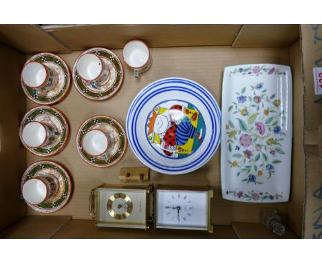 A mixed collection of items to include Greek Coffe Cups &amp; Saucers, Brass effect carriage clocks, Josie Firmin Comical bre