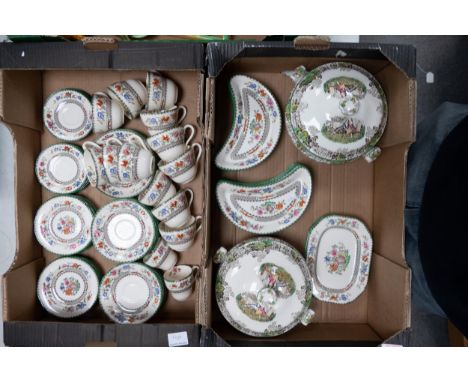 A large collection of Spode Chinese Rose patterned items to include tureens, tea cups &amp; saucers, half mood dishes etc (2 