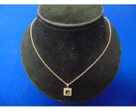 A Chopard Happy pendant on 18ct Gold chain