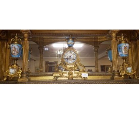 AN ATTRACTIVE THREE PIECE FRENCH GILT METAL MANTEL CLOCK GARNITURE, the clock movement with outside count wheel, striking on 