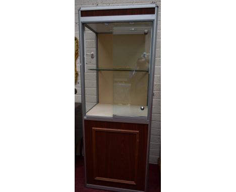 A PAIR OF MODERN GLAZED UPRIGHT SQUARE SHOP DISPLAY CABINETS, fitted with lights and two glass lockable doors. The interior w