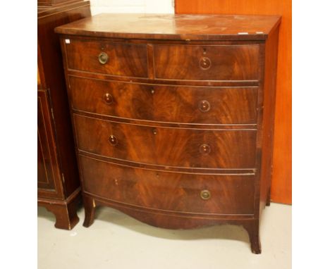 A REGENCY PERIOD EBONY STRUNG BOW-FRONTED CHEST. With three long and two short drawers. Raised on front splayed bracket feet.