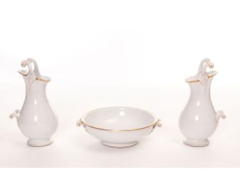 A VERY UNUSUAL PAIR OF BERNON'S PATENT PORCELAIN EWERS. Stamped Zuccani London. Trademark. Each cream ground of baluster form