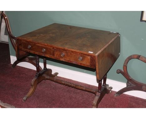 A REGENCY PERIOD MAHOGANY SOFA TABLE. Rectangular flaps with rounded corners, flanking two mock and two frieze drawers. Raise