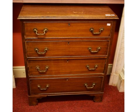 A GEORGIAN STYLE MAHOGANY FOUR DRAWER CHEST. O.R.M. Raised on bracket feet. 29" (74cm) wide. (1)