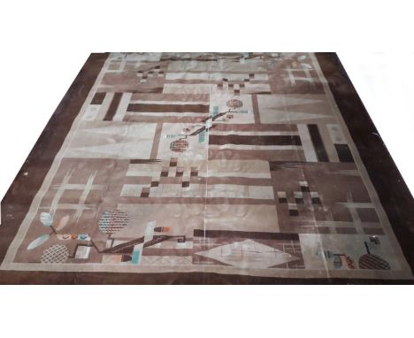 AN ART DECO, MACHINE-MADE CARPET. With geometric patterns on a fawn ground, inside a broad wide brown border. 10ft7 (322cm)l 