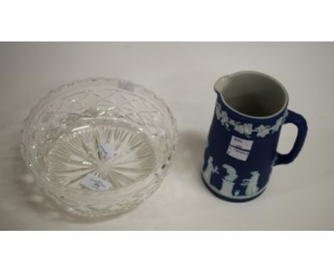 A WEDGEWOOD BLUE JASPERWARE JUG, decorated with figures and a band of vines. 6.25" (16cm) diameter. TOGETHER with a heavy cry