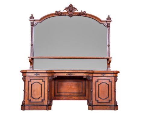 A MASSIVE VICTORIAN POLLARD-OAK AND EBONY MOUNTED SIDEBOARD. Large mirror-back with a cartouche crest above a shelf on invert