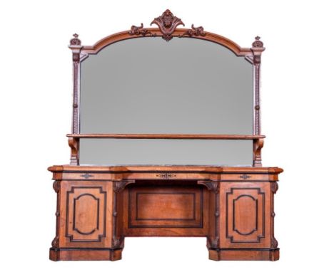 A MASSIVE VICTORIAN POLLARD-OAK AND EBONY MOUNTED SIDEBOARD. Large mirror-back with a cartouche crest above a shelf on invert