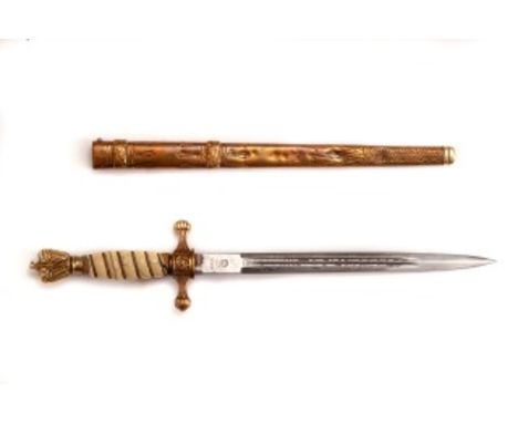 A WORLD WAR II GERMAN KRIEGSMARINE DAGGER, with cream celluloid spiral reeded wire bound grip, with chips. The 9.5" (24cm) do