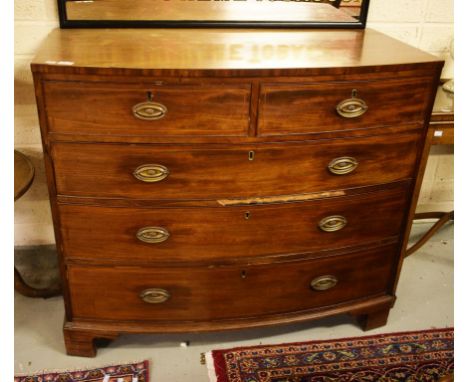 A REGENCY PERIOD INLAID MAHOGANY BOW-FRONTED CHEST. Three long and two short drawers. Raised on bracket feet. 44" (112cm) wid