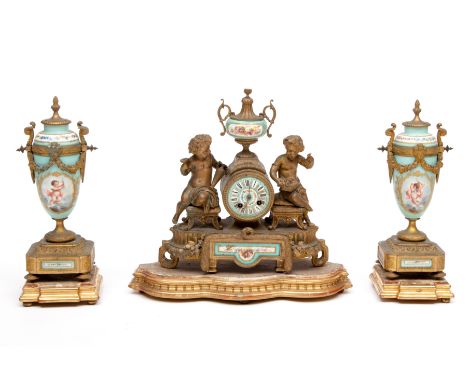 NINETEENTH CENTURY FRENCH GILT-METAL AND PORCELAIN MANTEL CLOCK GARNITURE. Movement by Japy Freres of Paris. Circular floral 