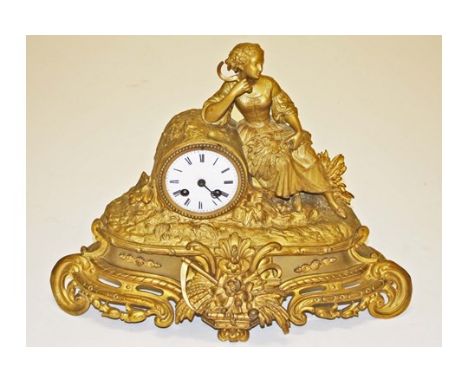 A FRENCH GILT-BRASS FIGURAL MANTEL CLOCK. Movement with an outside count wheel striking on a steel bell. Enamel dial with Rom