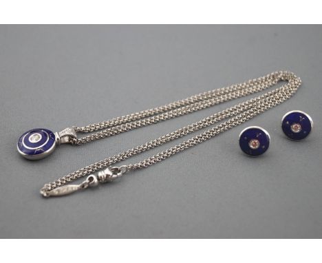 An 18ct white gold jewellery set Consisting of a circular pendant with blue enamel finish and a central round brilliant cut d