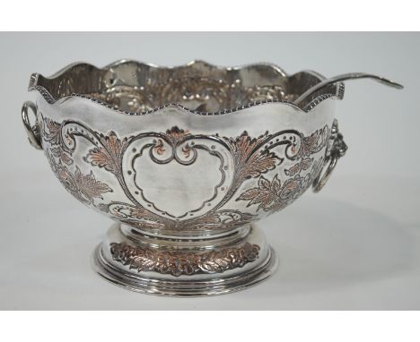 A mid 20th century silver plated punch bowl and ladle, of large proportions, the bowl with an undulating gadrooned edge, deco