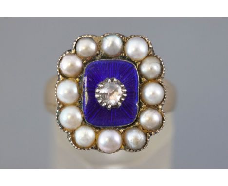 A Georgian yellow metal cluster ring having a blue enamel finish centrally set with a rose cut diamonds and surrounded by pea