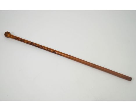 A Japanese carved bamboo cane walking stick, 85cm long