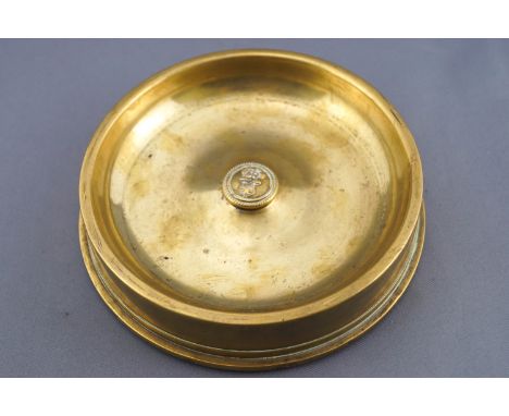 A 1918 brass shell end, 4" 80 calibre, converted to an ashtray, and set a Naval button, 14cm diameter