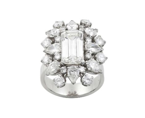 A Diamond Cluster Ringthe emerald-cut diamond within a border of pear cut diamonds spaced by pairs of round brilliant cut dia