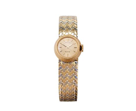 Rolex: A Lady's 18 Carat Gold Wristwatch, signed Rolex, model: Cameleon, ref: 8789, 1962, (calibre 1400) manual wound lever m