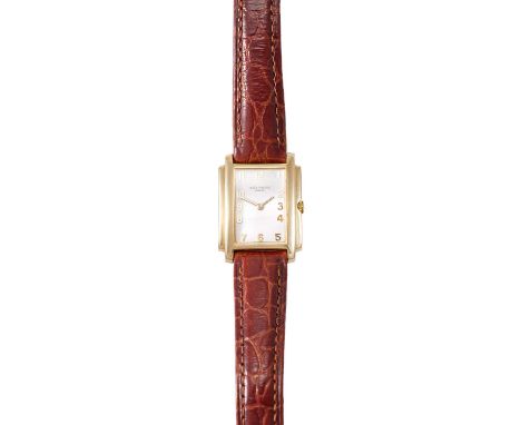 Patek Phillippe: A Lady's 18 Carat Gold Wristwatch, signed Patek Philippe, model: Gondolo, ref: 4824, circa 1995, (calibre E1