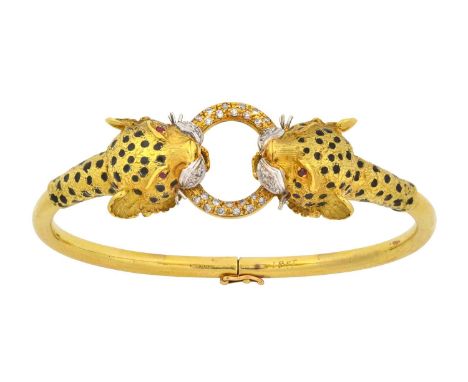 A Ruby, Diamond and Enamel Bangle realistically modelled as two leopards facing one another conjoined by an eight-cut pavé se