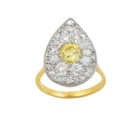 A Diamond Cluster Ring the oval cut fancy yellow diamond within a pear shaped border of old cut diamonds, in white pavé setti