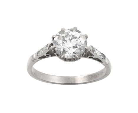 A Diamond Solitaire Ringthe old cut diamond in a white claw setting, to old cut diamond set shoulders, on a plain polished sh