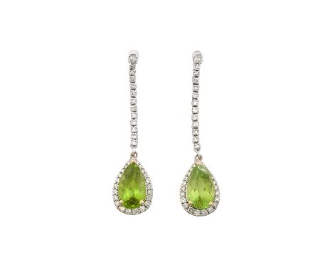 A Pair of 18 Carat White Gold Peridot and Diamond Drop Earringsa row of round brilliant cut diamonds suspends a pear cut peri