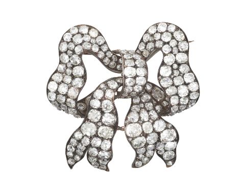 A Diamond Bow Brooch, circa 1850the stylised ribbon bow motif set throughout with old cut diamonds, in white claw settings, t