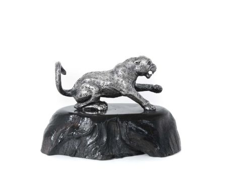 A Zimbabwean Silver Model of a Cheetah,  by Patrick Mavros, Harare, Circa 1990 realistically modelled with one paw raisedthe 