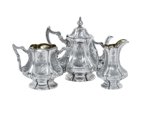 A Three-Piece Victorian Silver Tea-Service,  by Joseph Angell, London, 1849 and 1850 each piece tapering cylindrical and on s