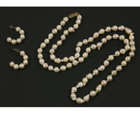 A single row uniform cultured baroque pearl necklace, with gold clasp, marked 375, and a pair of half hoop cultured pearl and