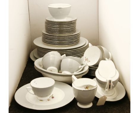A Minton china part dinner service, decorated with floral sprays within a dolphin grey border, comprising serving dishes, cup