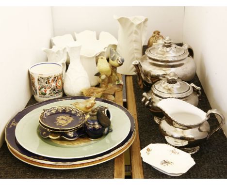 A quantity of decorative ceramics, to include Royal Worcester bird figures, leaf jugs, decorative plates, a silver finish tea