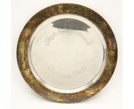 A modern circular silver charger by Peter Nichols, with engraved rim, with inscription, 35.5cm diameter, approximately 31oz* 