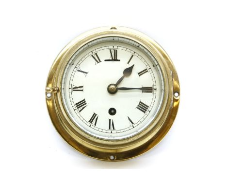 An Astral brass ship's clock, with single train movement, 10cm (4in) dial