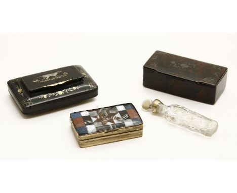 Three 19th century snuff boxes: the first tortoiseshell, inlaid with a mother of pearl dog and gold work, the second with har